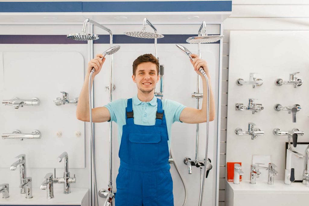 Technician in a client's home offering handyman plumbing services.