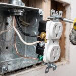 Wiring diagram showing hot, neutral, and ground terminal connections to replace an electrical outlet